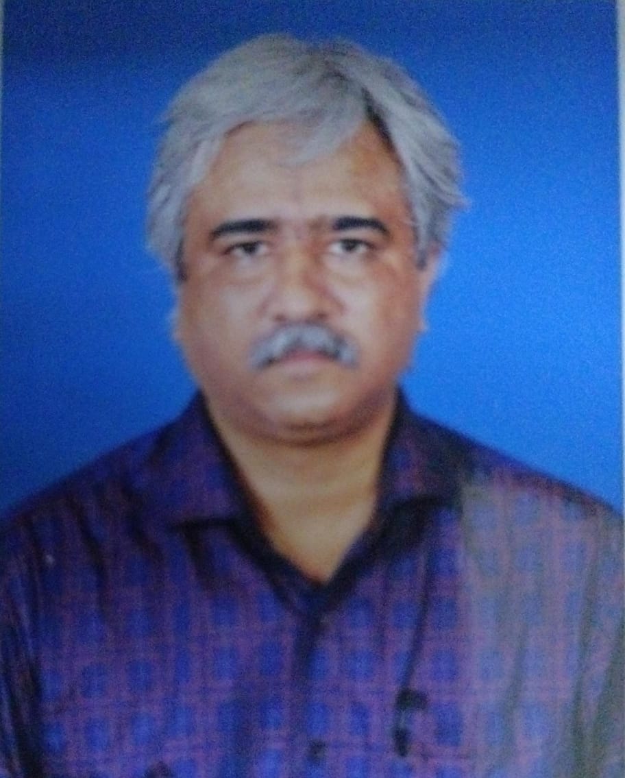 Dr Dharmender